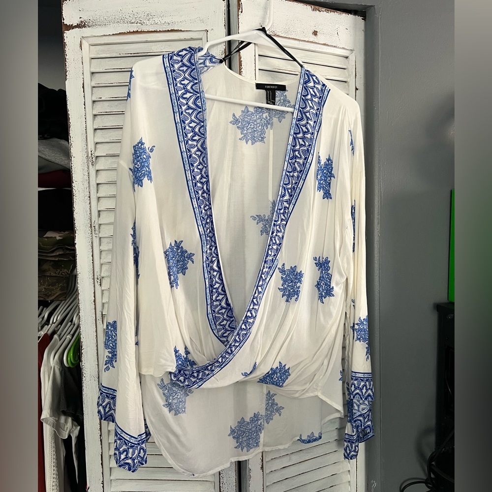 White blouse with blue detail